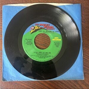 Elton John and Kiki Dee 7” Vinyl Record- “Don’t Go Breaking My Heart/Snow Queen”